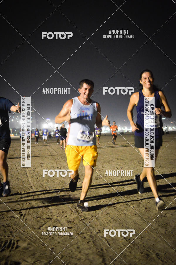 Buy your photos of the eventJovem Pan Night Run Santos on Fotop