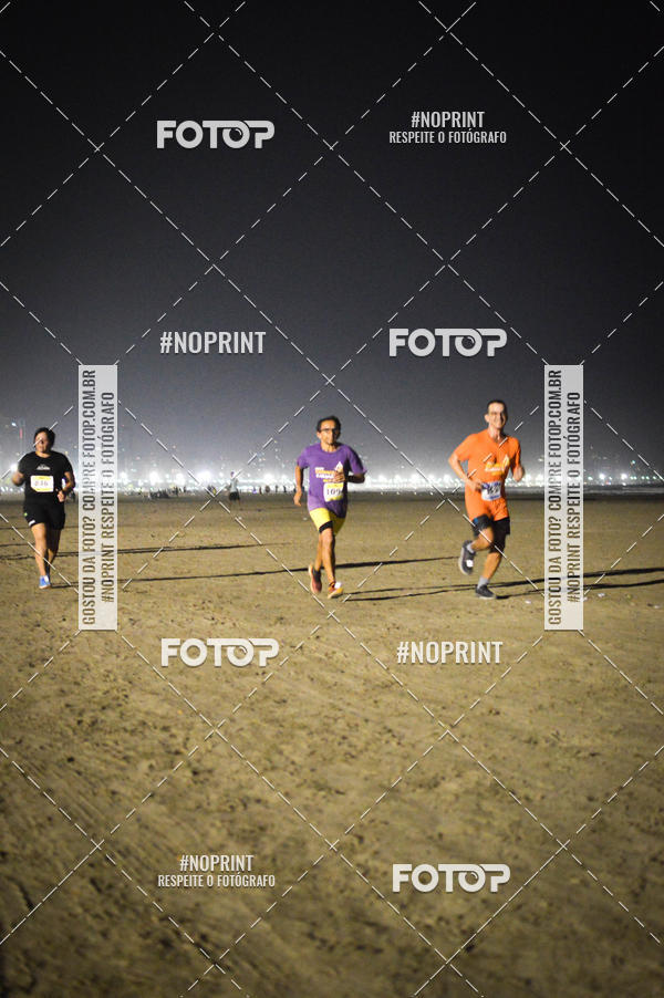 Buy your photos of the eventJovem Pan Night Run Santos on Fotop