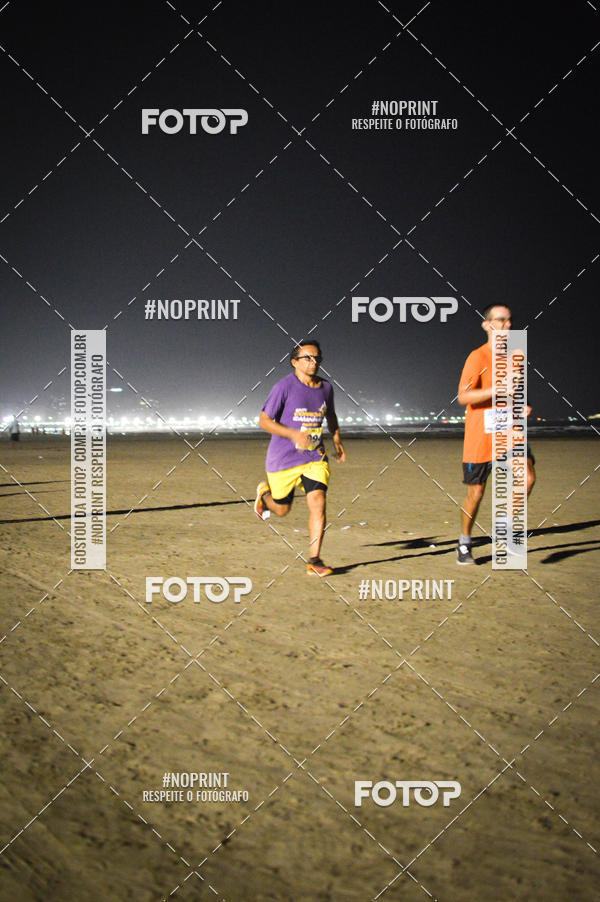 Buy your photos of the eventJovem Pan Night Run Santos on Fotop