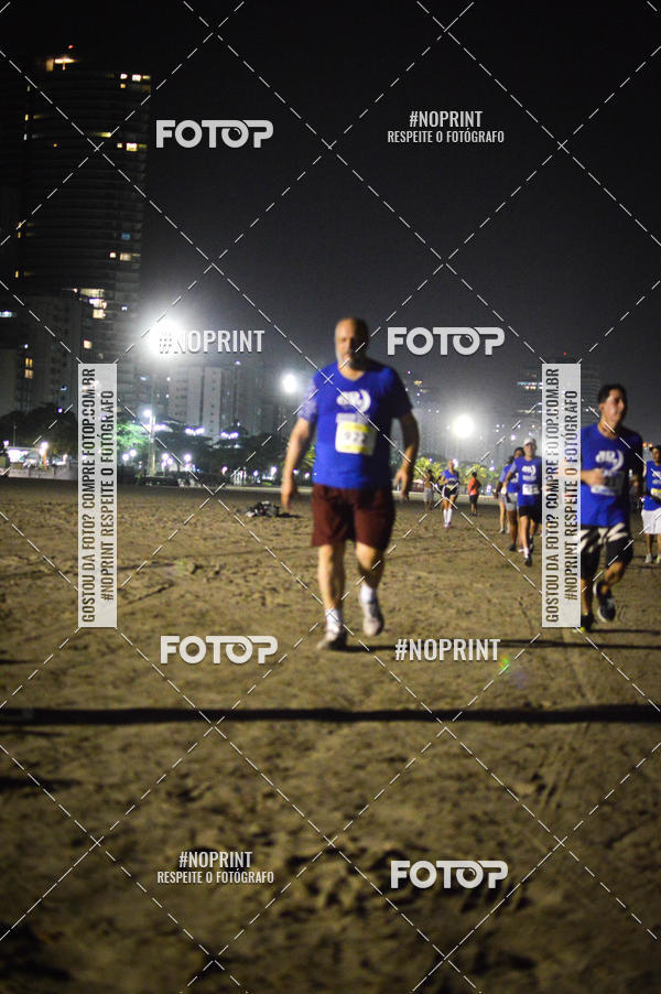 Buy your photos of the eventJovem Pan Night Run Santos on Fotop