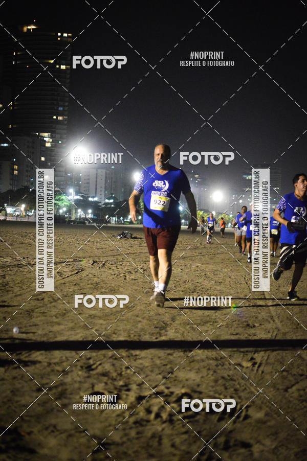 Buy your photos of the eventJovem Pan Night Run Santos on Fotop