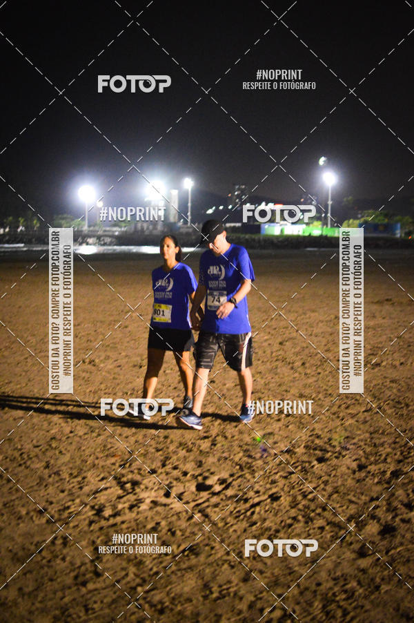 Buy your photos of the eventJovem Pan Night Run Santos on Fotop