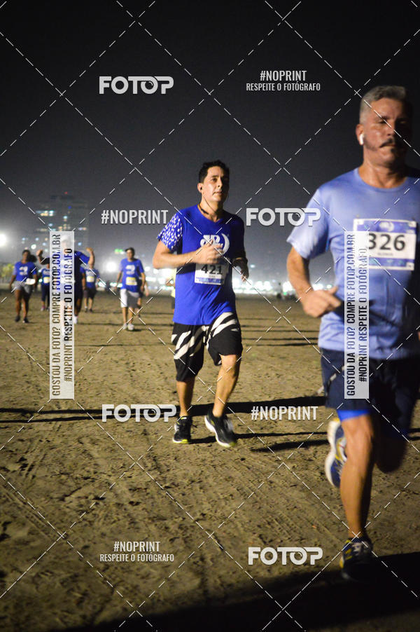 Buy your photos of the eventJovem Pan Night Run Santos on Fotop
