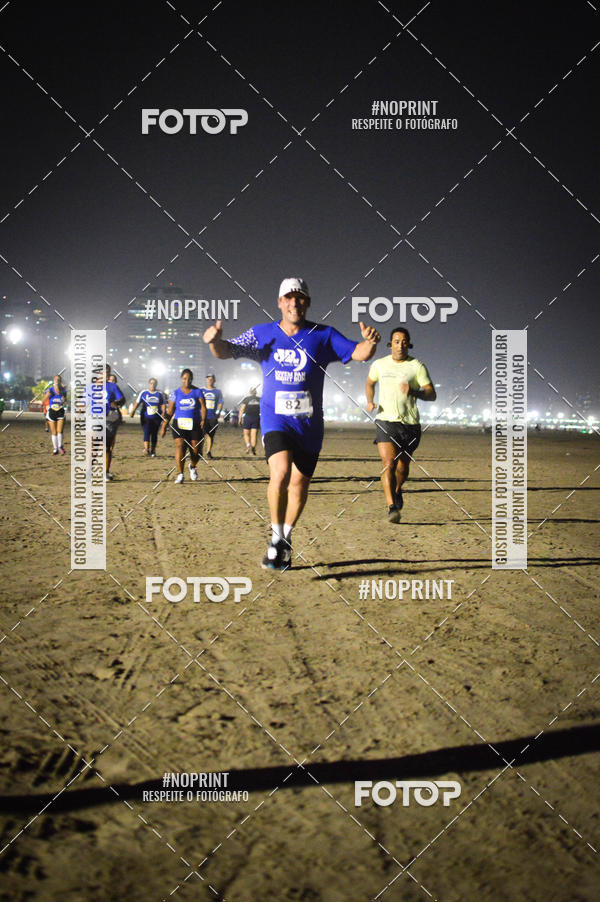 Buy your photos of the eventJovem Pan Night Run Santos on Fotop