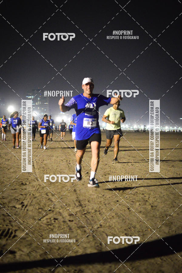 Buy your photos of the eventJovem Pan Night Run Santos on Fotop