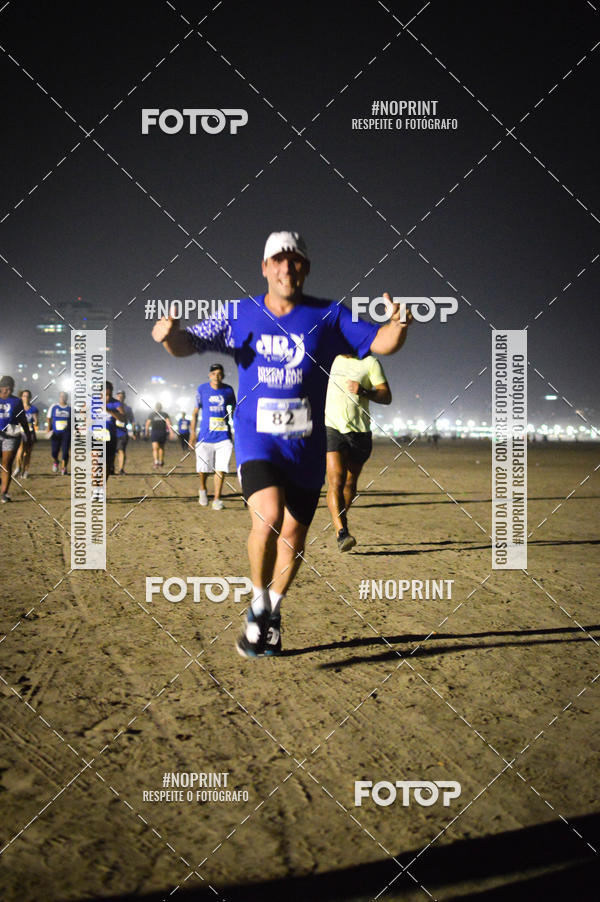 Buy your photos of the eventJovem Pan Night Run Santos on Fotop