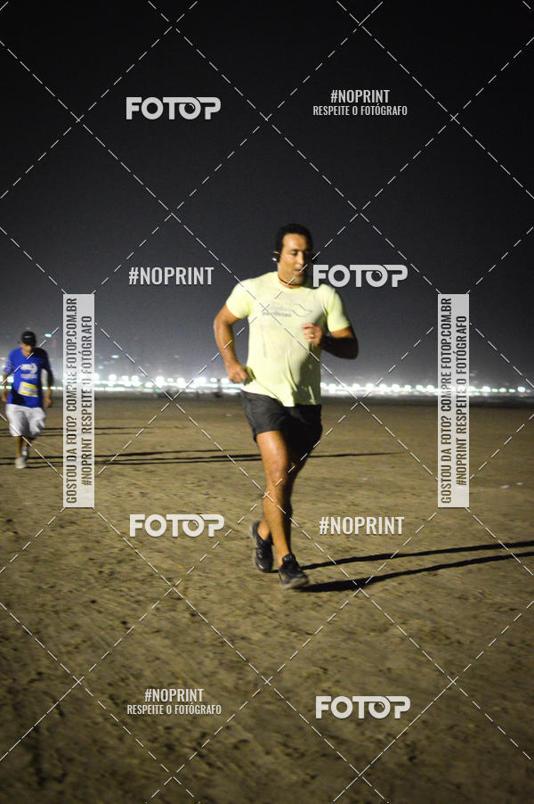 Buy your photos of the eventJovem Pan Night Run Santos on Fotop