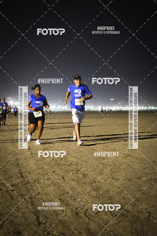 Buy your photos of the eventJovem Pan Night Run Santos on Fotop