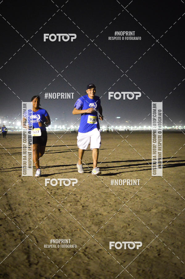 Buy your photos of the eventJovem Pan Night Run Santos on Fotop