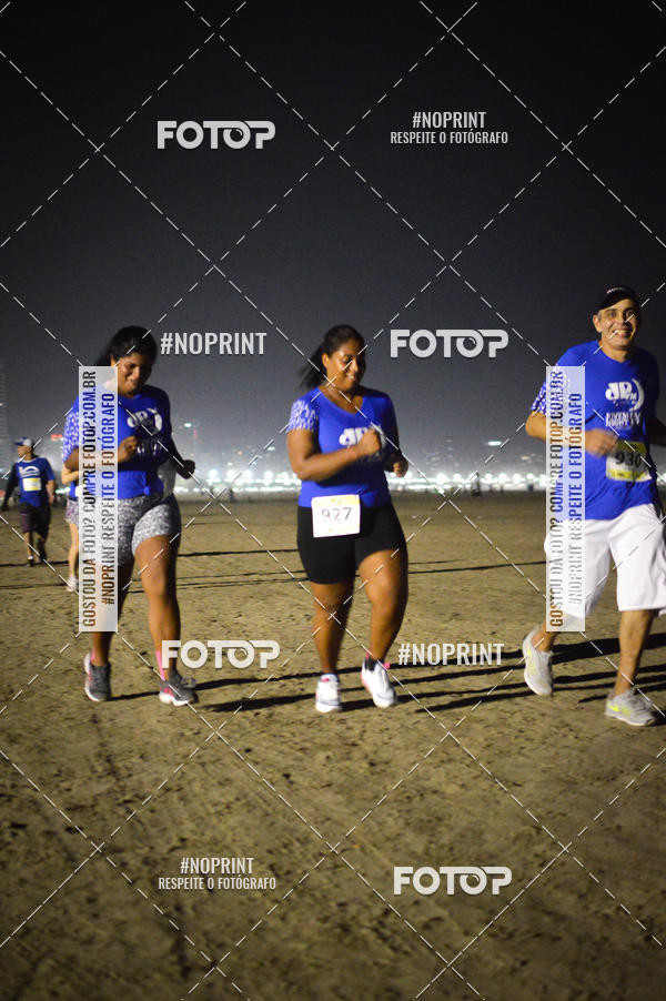 Buy your photos of the eventJovem Pan Night Run Santos on Fotop