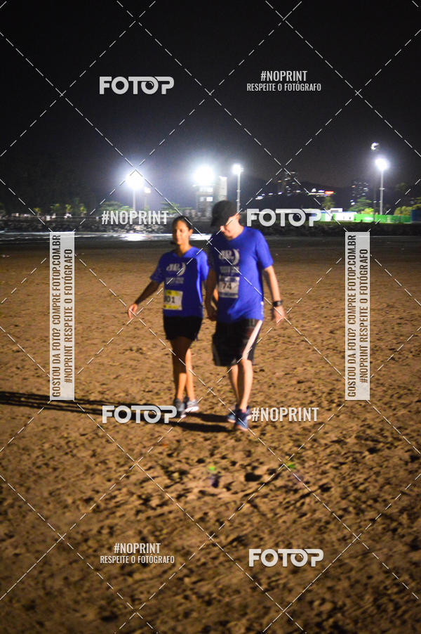 Buy your photos of the eventJovem Pan Night Run Santos on Fotop