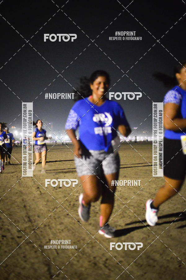Buy your photos of the eventJovem Pan Night Run Santos on Fotop