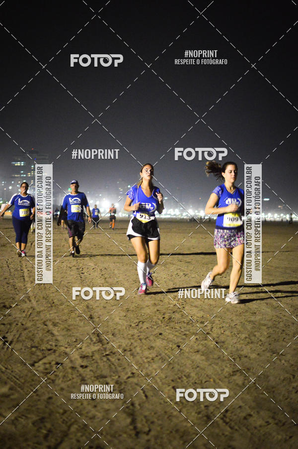 Buy your photos of the eventJovem Pan Night Run Santos on Fotop
