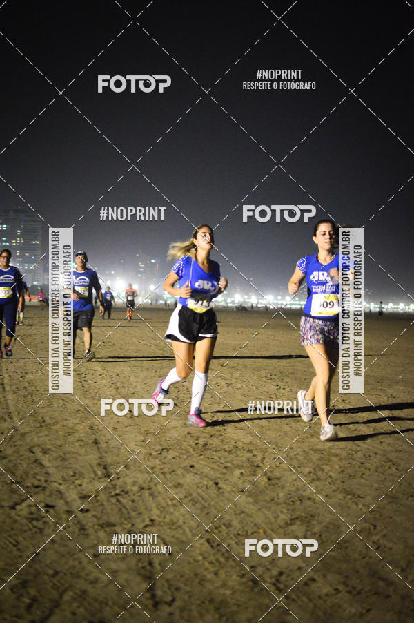 Buy your photos of the eventJovem Pan Night Run Santos on Fotop