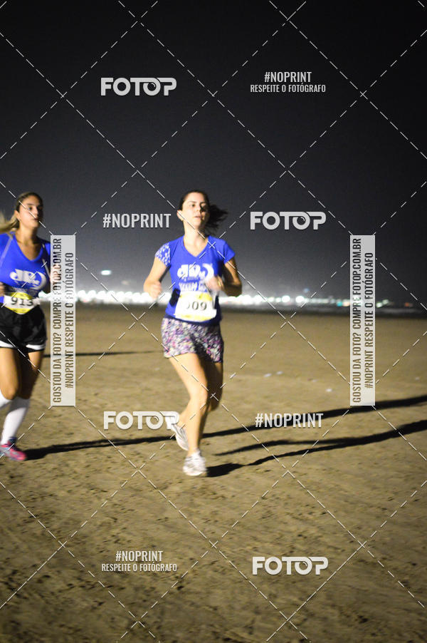 Buy your photos of the eventJovem Pan Night Run Santos on Fotop