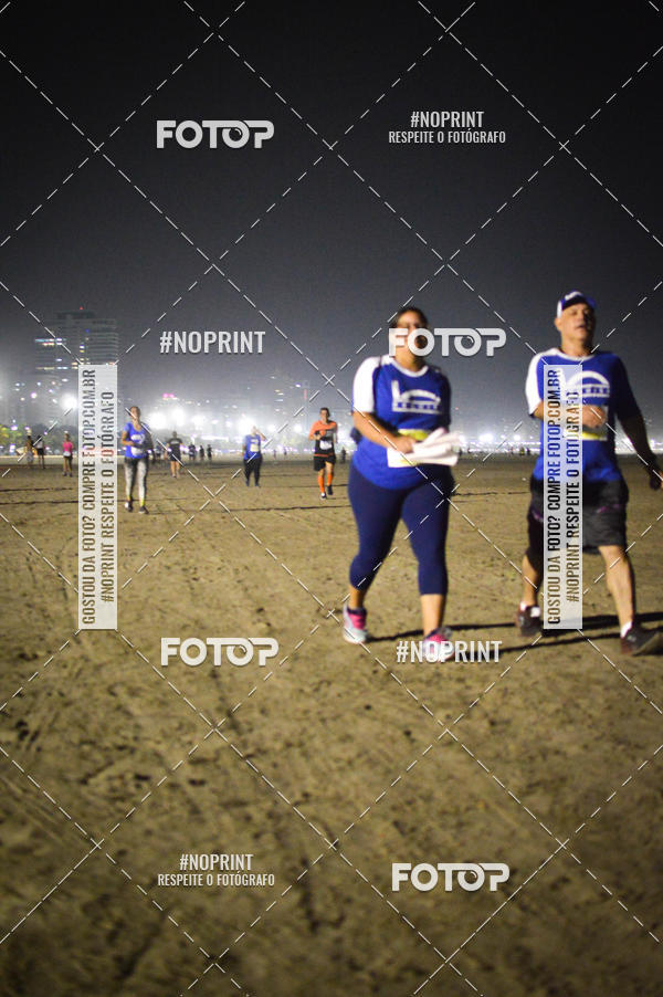 Buy your photos of the eventJovem Pan Night Run Santos on Fotop