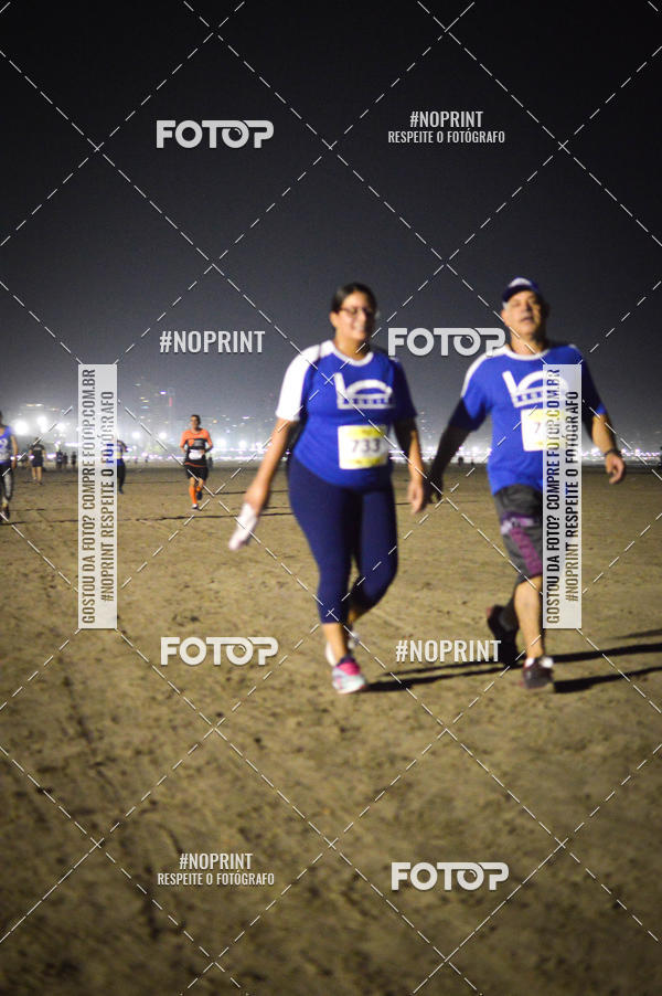 Buy your photos of the eventJovem Pan Night Run Santos on Fotop