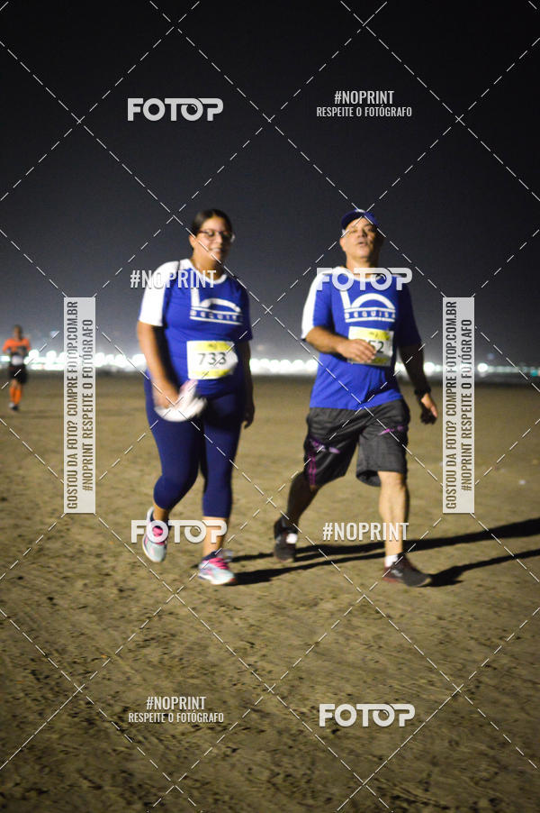 Buy your photos of the eventJovem Pan Night Run Santos on Fotop