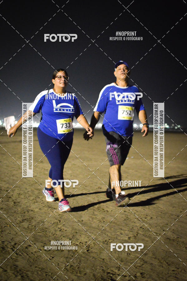 Buy your photos of the eventJovem Pan Night Run Santos on Fotop