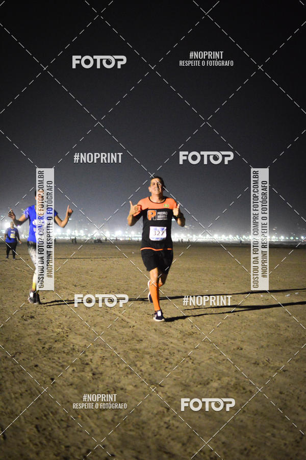 Buy your photos of the eventJovem Pan Night Run Santos on Fotop