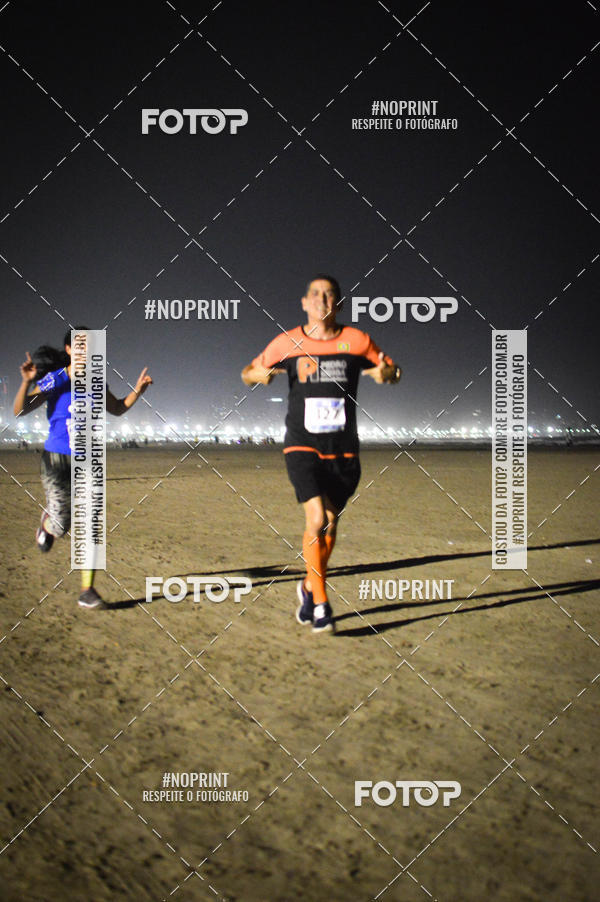 Buy your photos of the eventJovem Pan Night Run Santos on Fotop