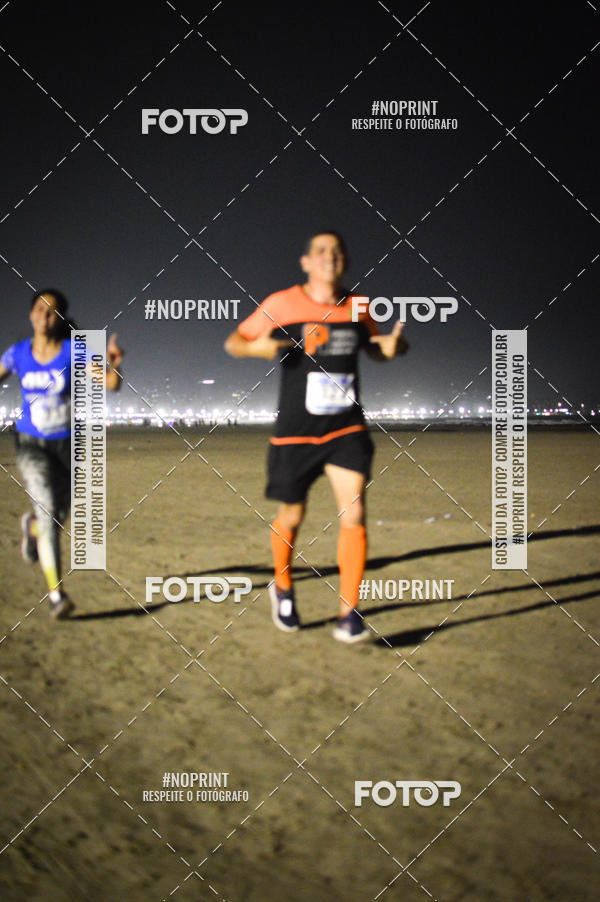 Buy your photos of the eventJovem Pan Night Run Santos on Fotop