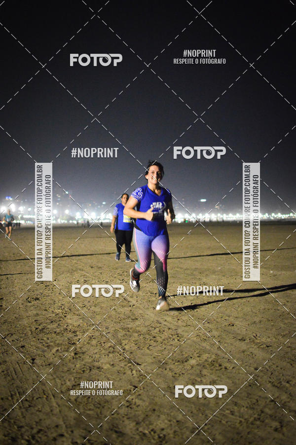 Buy your photos of the eventJovem Pan Night Run Santos on Fotop