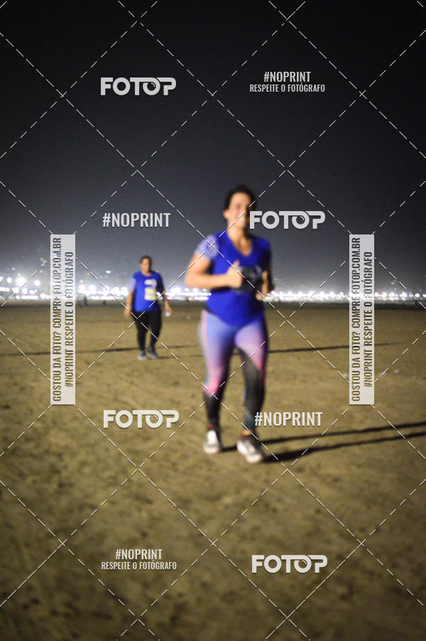 Buy your photos of the eventJovem Pan Night Run Santos on Fotop