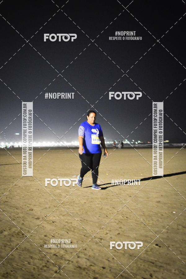 Buy your photos of the eventJovem Pan Night Run Santos on Fotop