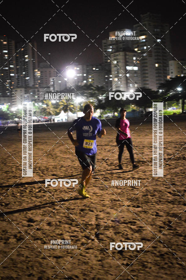 Buy your photos of the eventJovem Pan Night Run Santos on Fotop