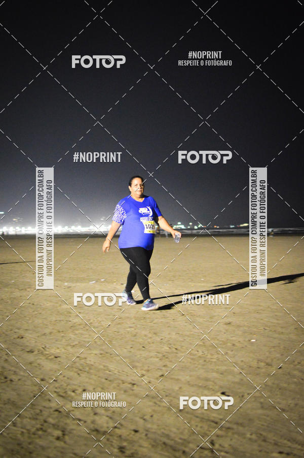 Buy your photos of the eventJovem Pan Night Run Santos on Fotop