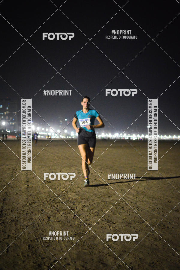 Buy your photos of the eventJovem Pan Night Run Santos on Fotop