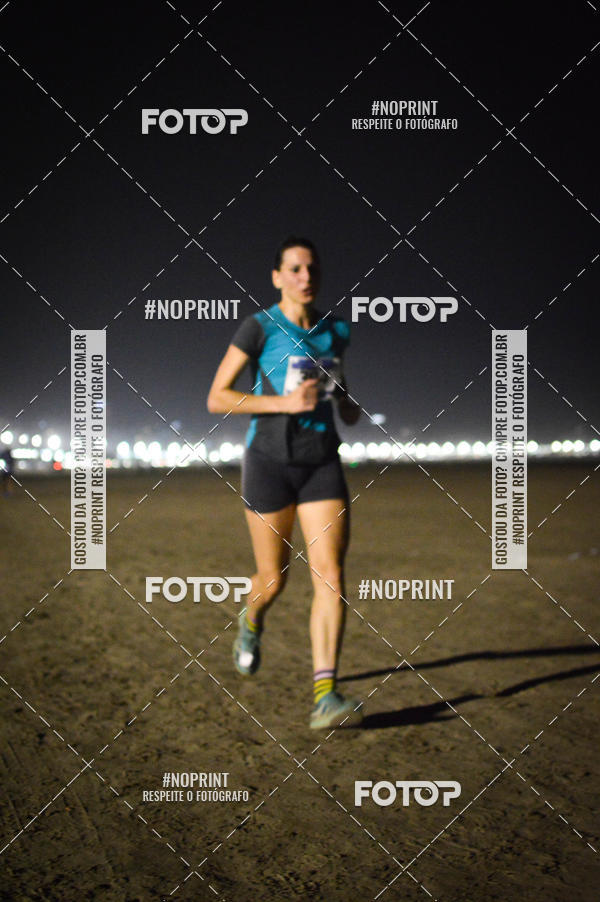 Buy your photos of the eventJovem Pan Night Run Santos on Fotop