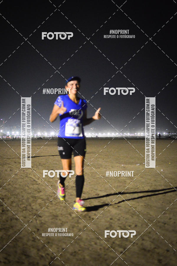 Buy your photos of the eventJovem Pan Night Run Santos on Fotop