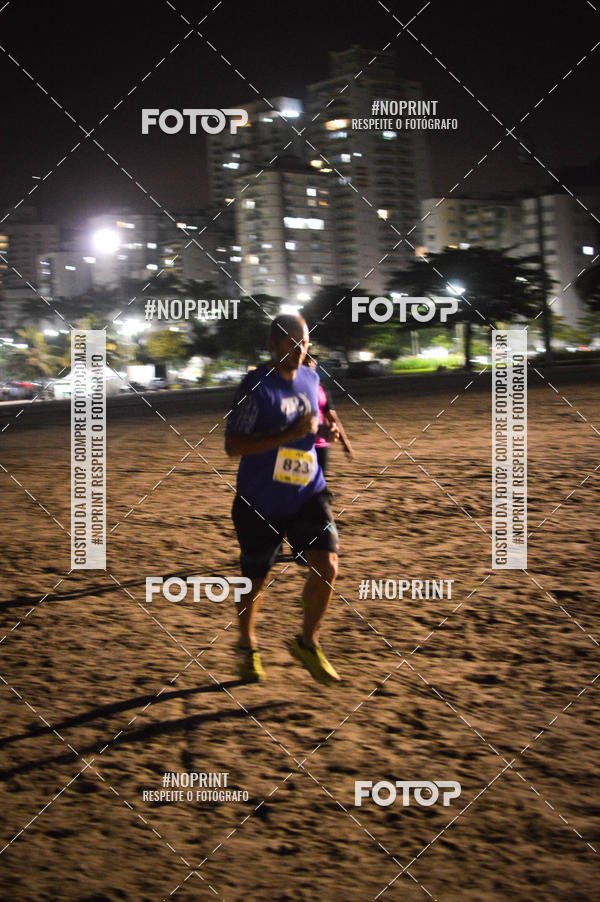 Buy your photos of the eventJovem Pan Night Run Santos on Fotop