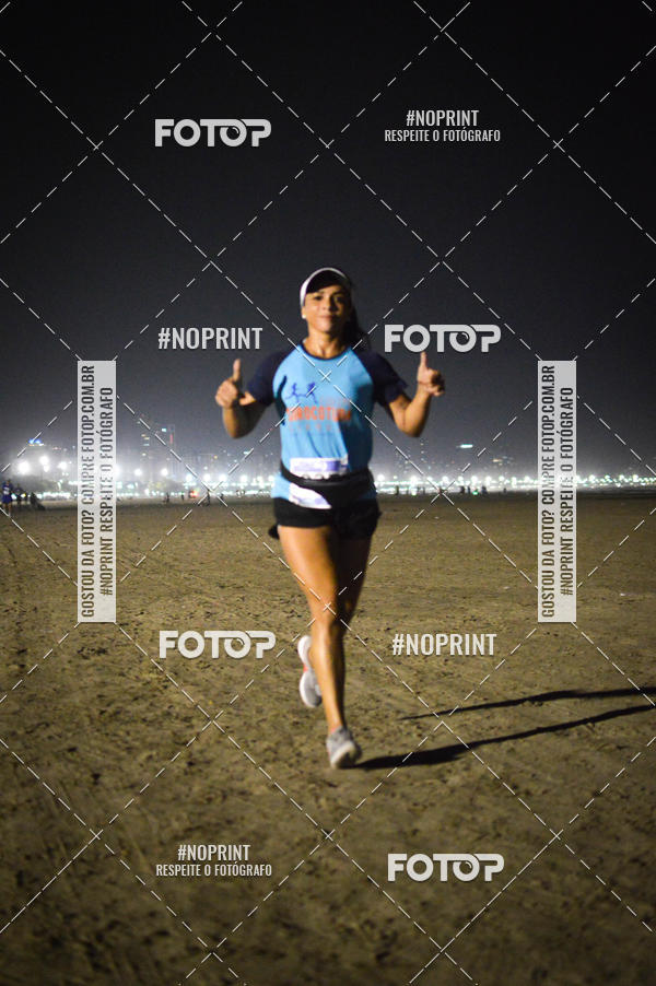 Buy your photos of the eventJovem Pan Night Run Santos on Fotop