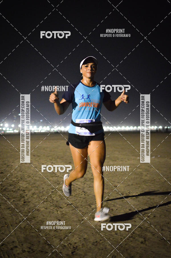 Buy your photos of the eventJovem Pan Night Run Santos on Fotop
