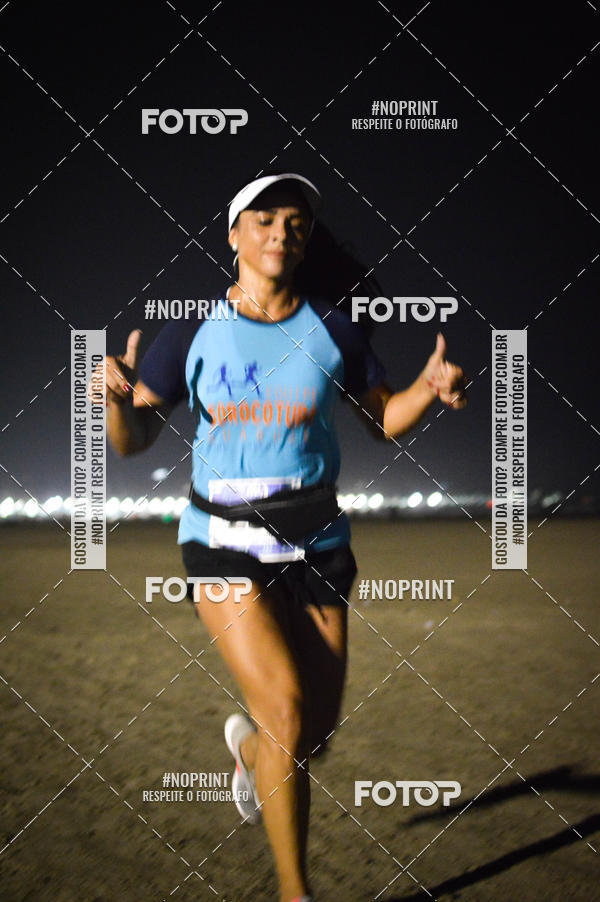 Buy your photos of the eventJovem Pan Night Run Santos on Fotop