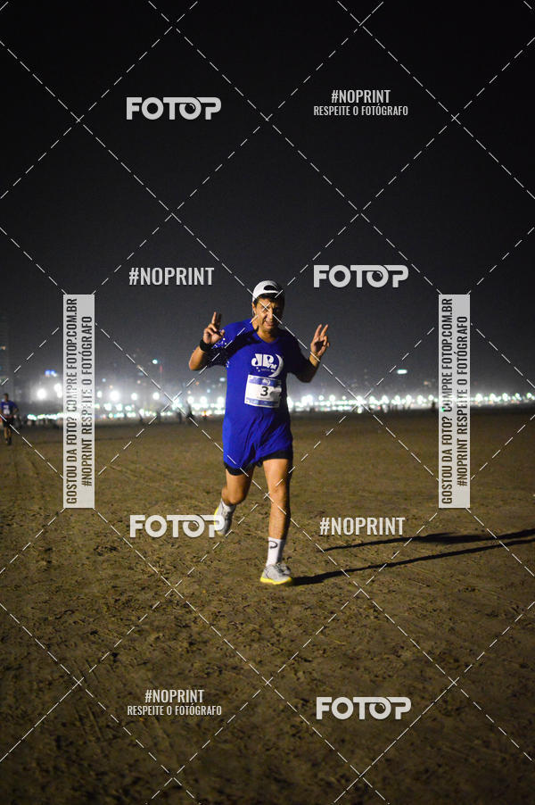 Buy your photos of the eventJovem Pan Night Run Santos on Fotop