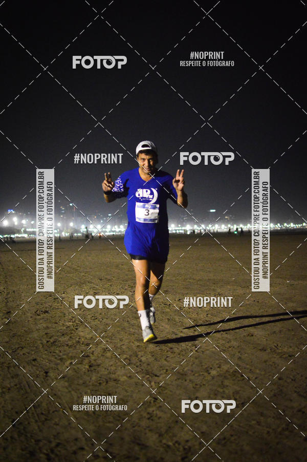 Buy your photos of the eventJovem Pan Night Run Santos on Fotop