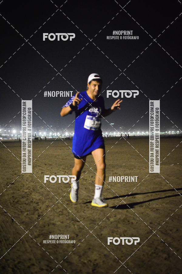 Buy your photos of the eventJovem Pan Night Run Santos on Fotop
