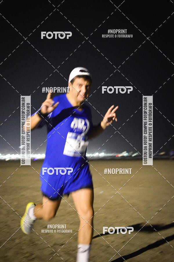 Buy your photos of the eventJovem Pan Night Run Santos on Fotop