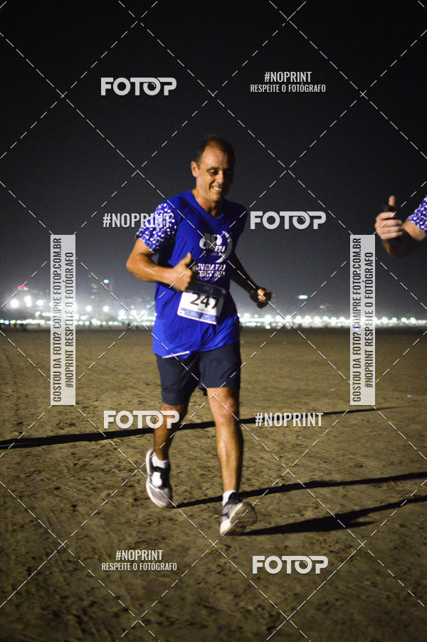 Buy your photos of the eventJovem Pan Night Run Santos on Fotop