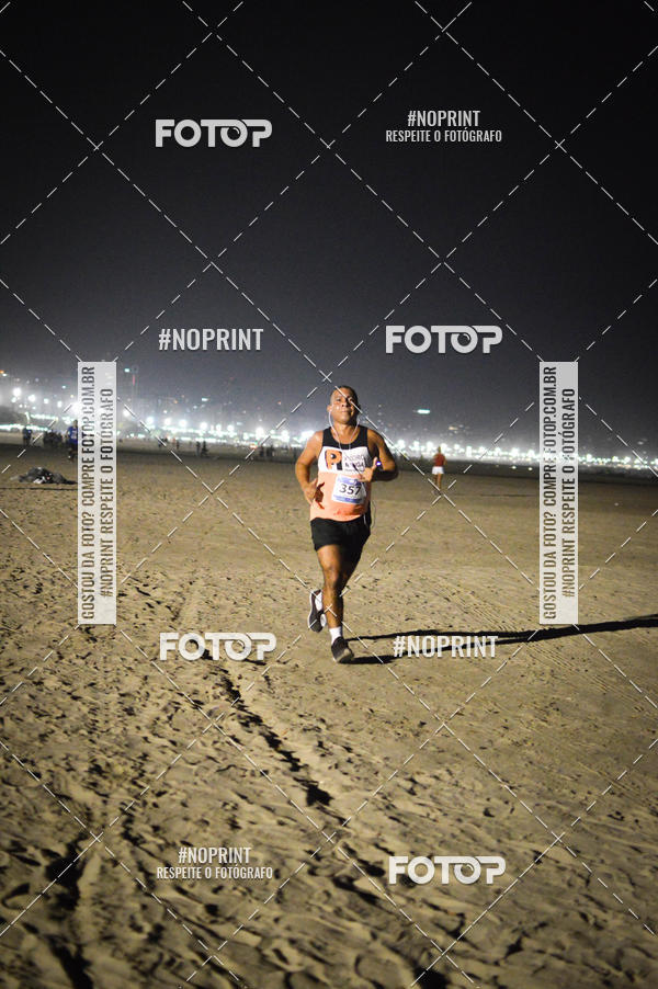 Buy your photos of the eventJovem Pan Night Run Santos on Fotop