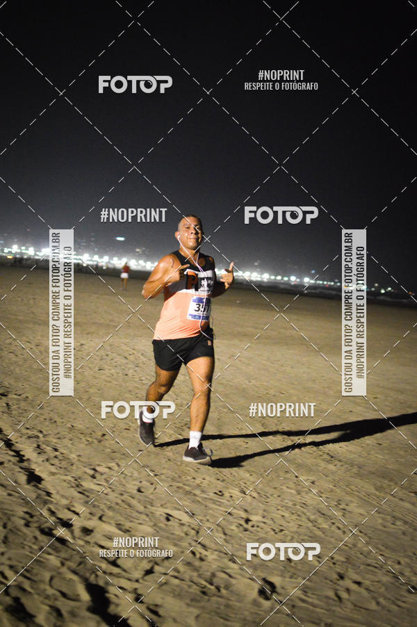 Buy your photos of the eventJovem Pan Night Run Santos on Fotop