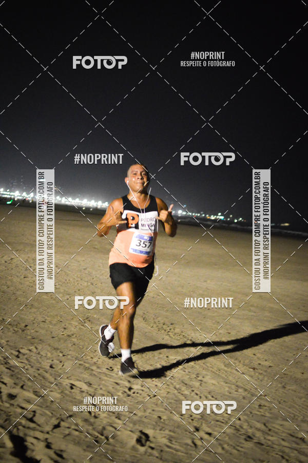 Buy your photos of the eventJovem Pan Night Run Santos on Fotop
