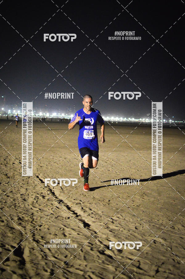 Buy your photos of the eventJovem Pan Night Run Santos on Fotop