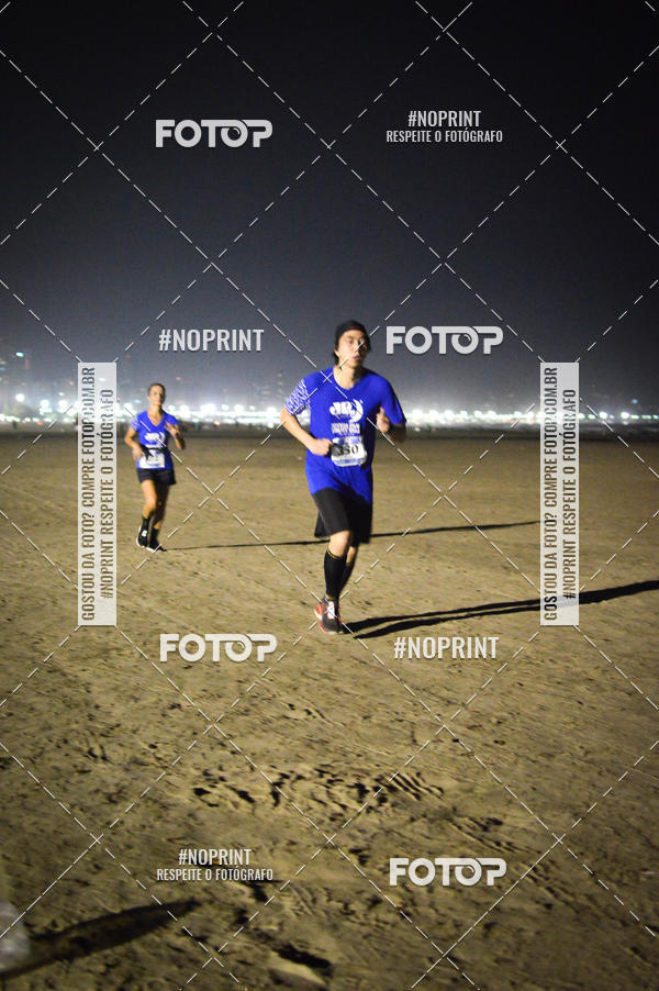 Buy your photos of the eventJovem Pan Night Run Santos on Fotop