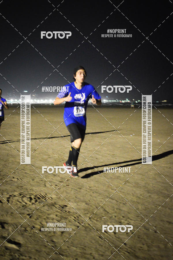 Buy your photos of the eventJovem Pan Night Run Santos on Fotop