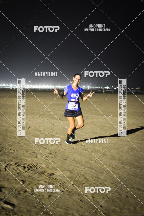 Buy your photos of the eventJovem Pan Night Run Santos on Fotop